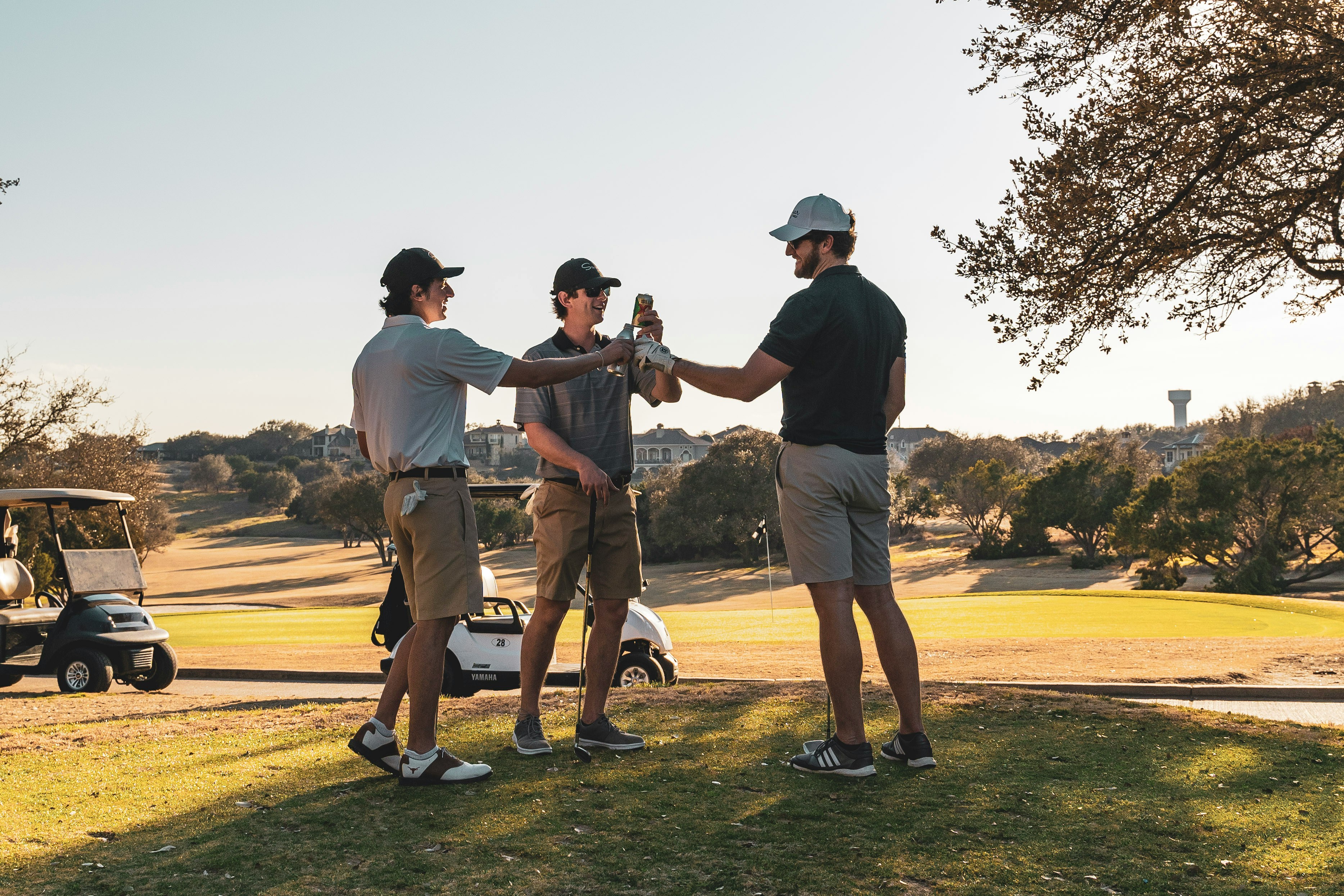 Golfers celebrating on the course
